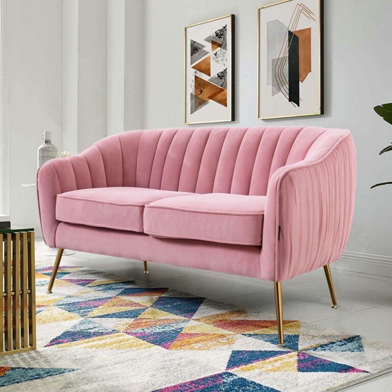 blush pink velvet loveseat sofa with gold legs and channel tufting