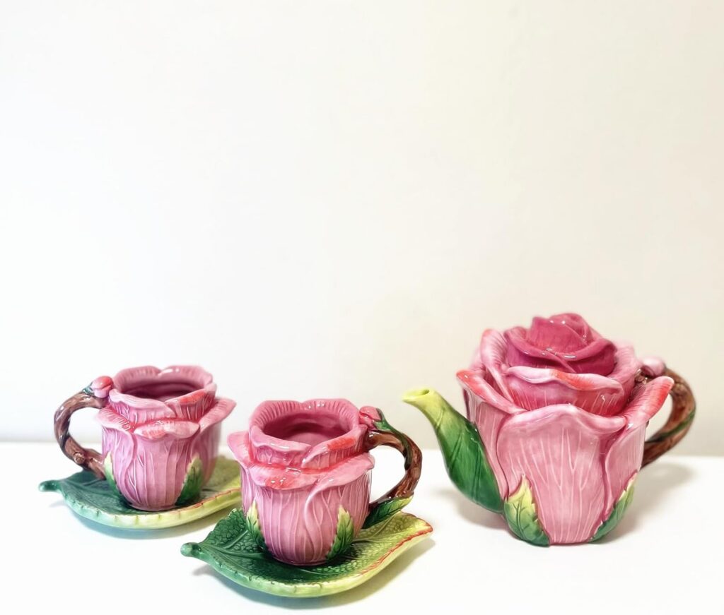 ceramic rose teapot set with hand-painted floral teapot cups and green leaf saucers pink red