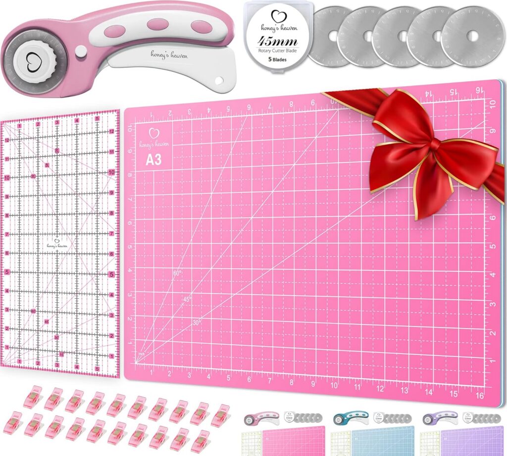 pink rotary cutter set with cutting mat ruler and replacement blades sewing kit