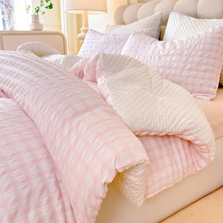 Blush pink jacquard seersucker comforter set with textured plaid design and matching pillowcases