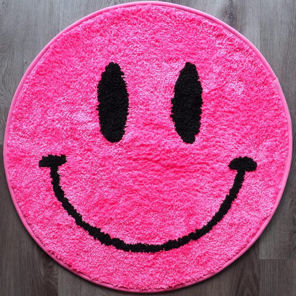 hot pink round fluffy bath mat with playful retro aesthetic design for bathroom and bedroom decor