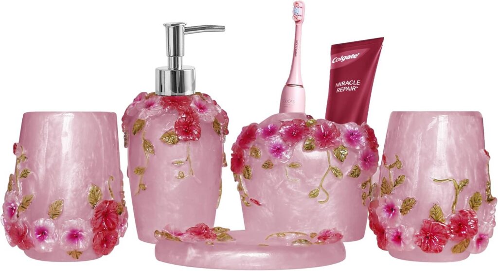 vintage pink bathroom accessories set with soap dispenser toothbrush holder tumbler soap dish and coordinating decor pieces