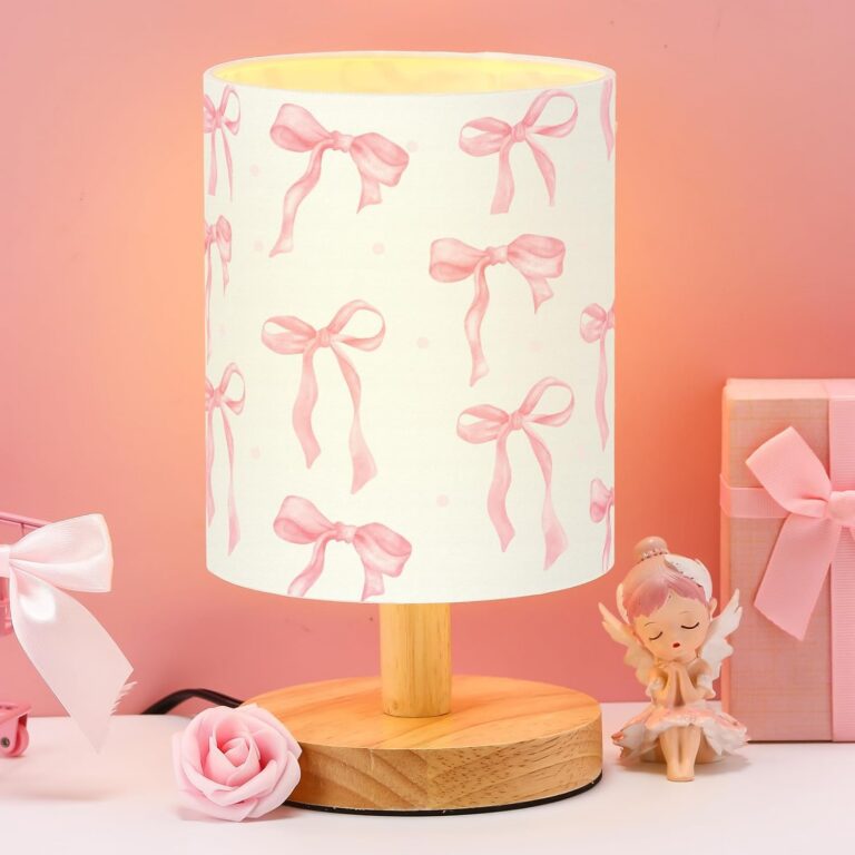pink bow bedside table lamp with linen lampshade and wooden style base for nursery or bedroom decor