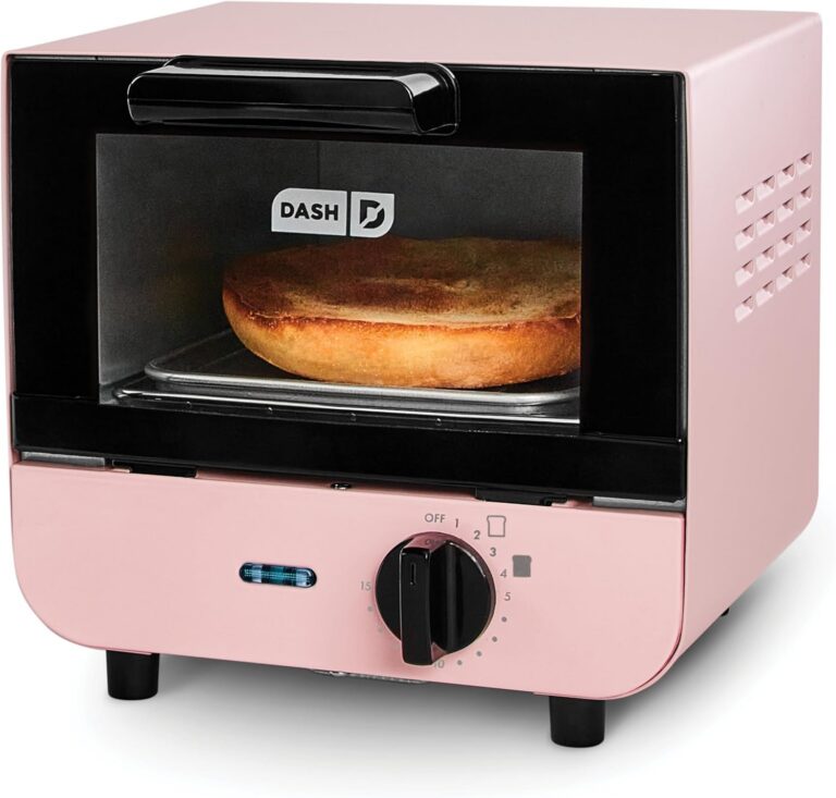 pink Dash mini toaster oven with compact countertop design and removable baking tray