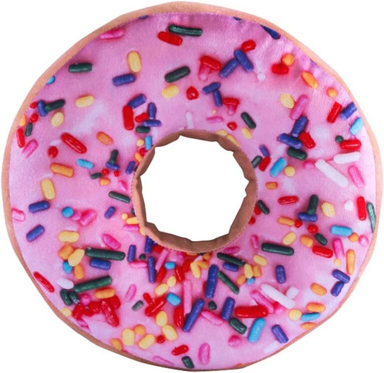 Pink donut shaped throw pillow with soft plush fabric and realistic 3D printed frosting design for couch or bedroom decor