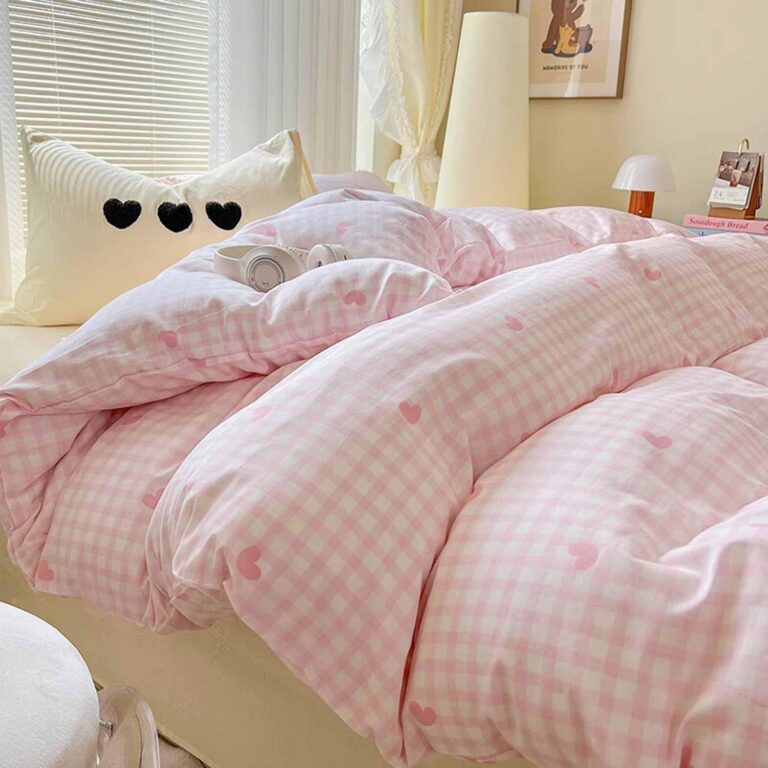 Pink and white gingham comforter set with small heart pattern and matching pillow shams