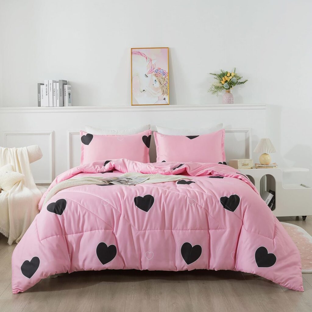 Blush pink microfiber comforter set with black heart pattern and matching pillowcases