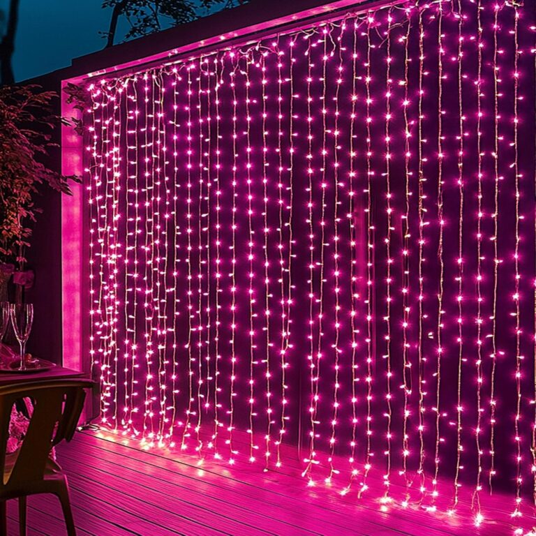 pink LED curtain fairy string lights hanging on a bedroom wall with glowing decorative ambiance