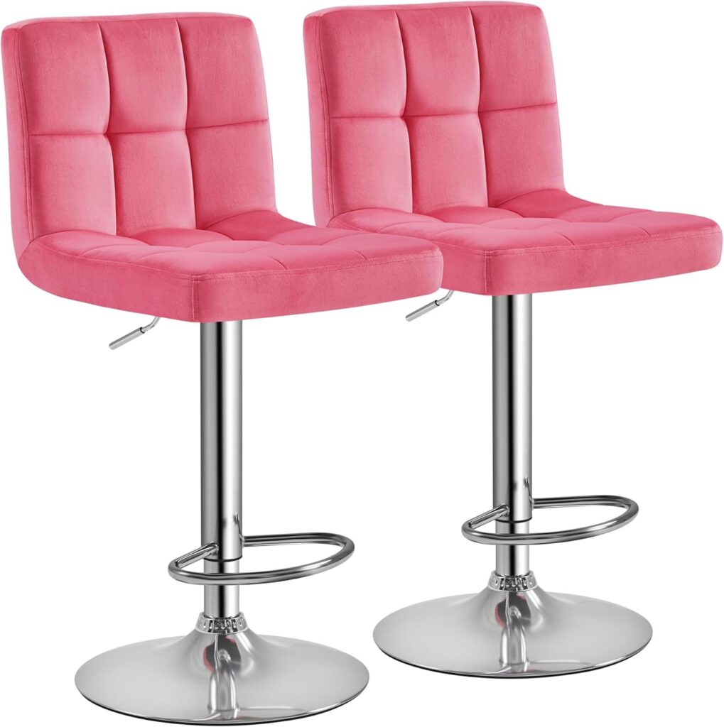 set of pink velvet adjustable swivel bar stools with modern counter height design and metal base