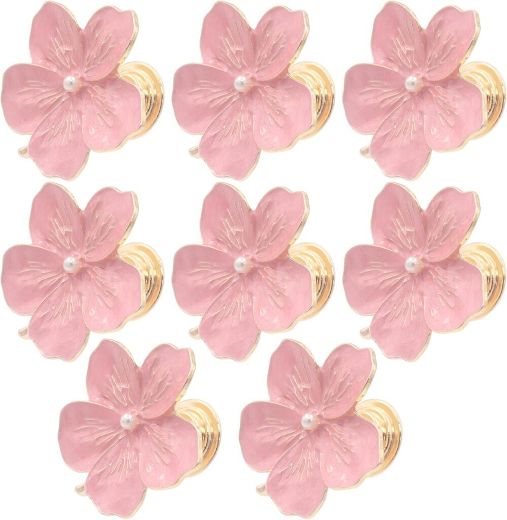 Set of eight pink flower cabinet knobs made from durable zinc alloy with sparkling rhinestone centers, satin metallic finish, and mounting screws for updating dressers, drawers, cabinets, closet doors, and furniture with elegant floral hardware.