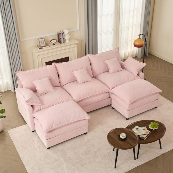 Modern pink modular U-shaped chenille cloud sectional sofa with extra-deep seating, movable ottoman, removable cushions, and plush foam padding for stylish living room décor.