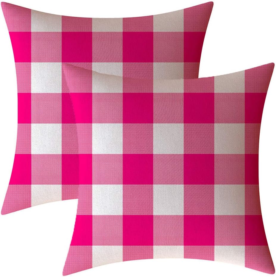 Set of two pink and white buffalo check plaid throw pillow covers with an invisible zipper, designed for 18 x 18 inch cushions for farmhouse-inspired indoor and outdoor décor.
