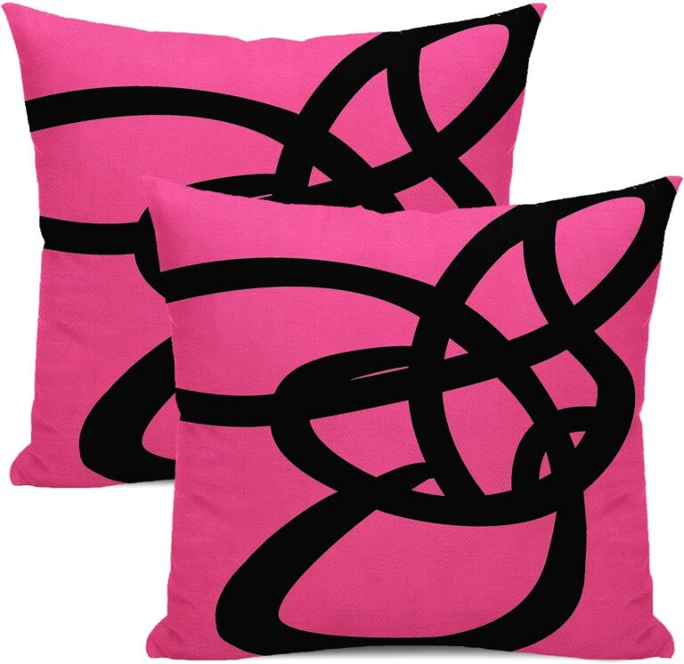 Set of two black and hot pink decorative linen throw pillow covers featuring a modern abstract geometric line print with hidden zipper closures.