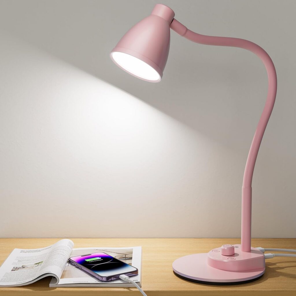 Pink LED desk lamp with flexible gooseneck, USB charging port, three color modes, stepless dimming, and flicker-free adjustable lighting for home offices, dorm rooms, and bedside tables.