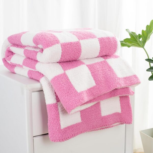 Hot pink checkered reversible microfiber throw blanket with a soft fuzzy plush texture, designed for couches, beds, sofas, and cozy home décor.