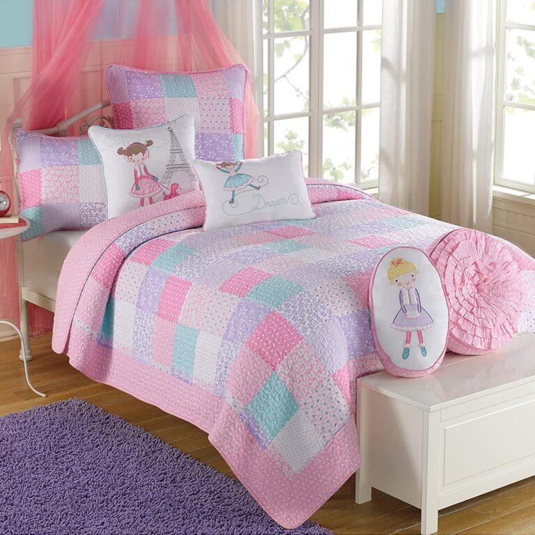 Twin-size reversible cotton quilt set with pink, light purple, and blue floral patterns, including one quilt and one matching pillow sham for year-round bedroom comfort.