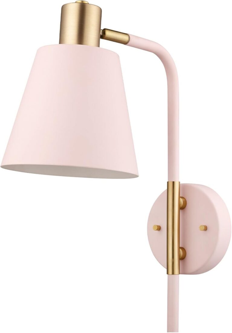Blush pink metal wall sconce with matte brass accents and a black cloth cord, featuring plug-in or hardwired installation for stylish accent lighting in bedrooms, living rooms, and hallways.