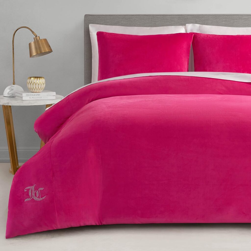 Hot pink Juicy Couture Full/Queen velour comforter set with a plush microfiber finish, rhinestone logo detail, and two matching pillow shams for glamorous bedroom décor.