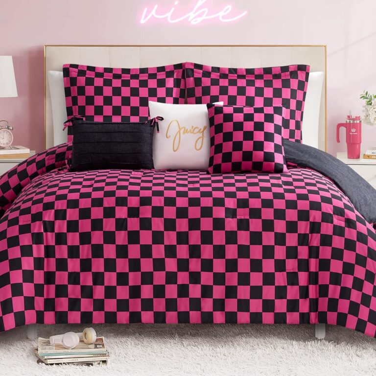 Juicy Couture reversible 6-piece Full/Queen comforter set featuring a black and hot pink checkerboard comforter, matching pillow shams, and three decorative accent pillows.