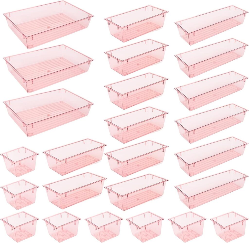 KeFanta 25-piece pink clear plastic drawer organizer tray set with stackable storage bins in four sizes for organizing makeup, jewelry, office supplies, bathroom essentials, and kitchen drawers.