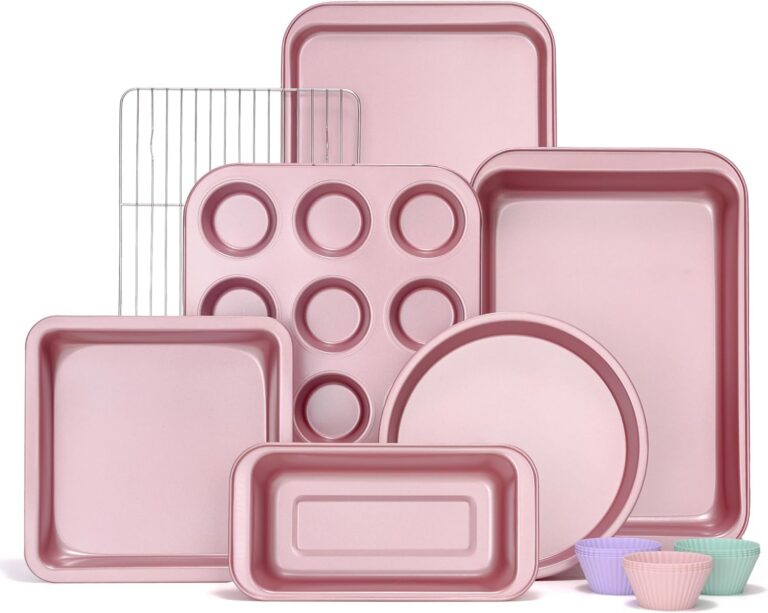 Pink 7-piece nonstick carbon steel bakeware set with a round cake pan, square cake pan, loaf pan, muffin pan, cookie sheet, roasting pan, and cooling rack for baking and roasting.