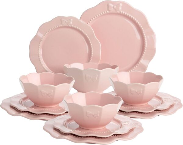 Pink 12-piece stoneware dinnerware set by Paris Hilton featuring embossed bow details with four dinner plates, four salad plates, and four bowls that are microwave and dishwasher safe.