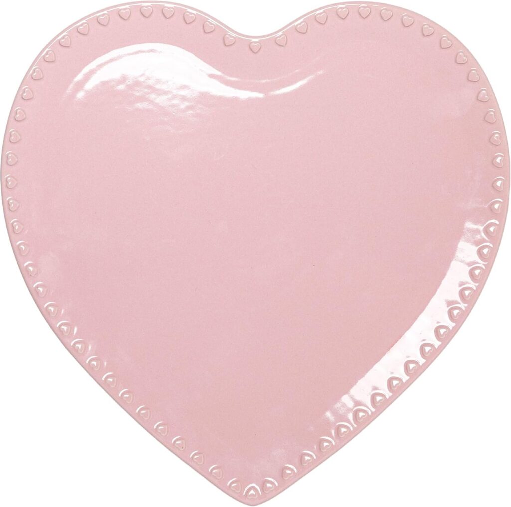 Paris Hilton 12-inch pink ceramic stoneware heart-shaped cake plate with a glossy finish for serving cakes, pastries, desserts, cookies, appetizers, and charcuterie at parties and everyday gatherings.