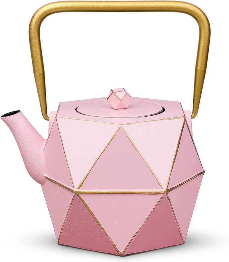 Toptier pink diamond cast iron teapot with a fully enameled interior, removable stainless steel infuser, and fold-down handle for brewing loose leaf tea on the stovetop.