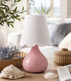 Pink cordless ceramic table lamp with a glossy teardrop-shaped base, scalloped linen shade, and rechargeable magnetic LED bulb.
